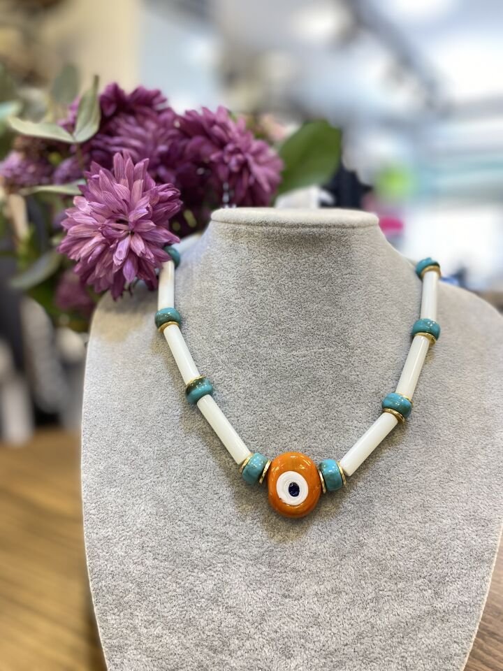 TURUNCU GÖZ FİGÜR KO BEYAZ