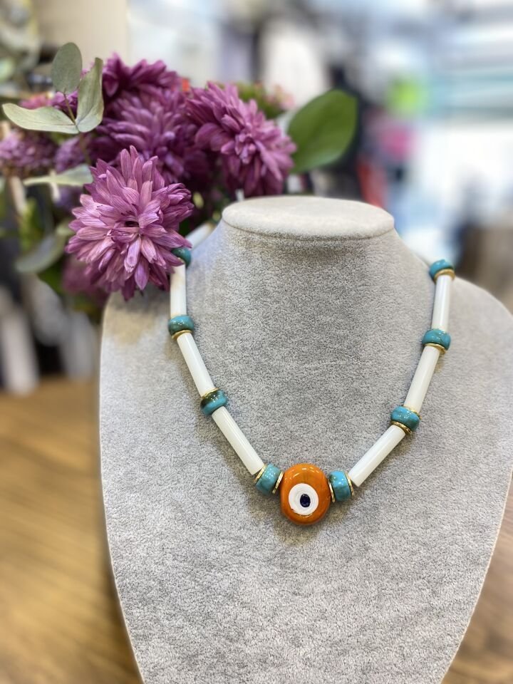 TURUNCU GÖZ FİGÜR KO BEYAZ